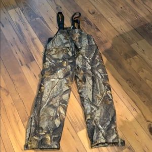 Red head youth bib coveralls.